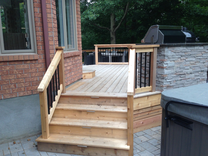 Kanata Deck Construction Project With Outdoor Kitchen And Hot Tub